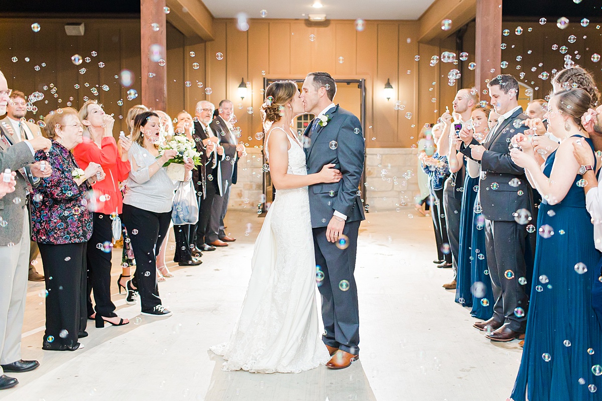 A navy blue 2K reserve wedding bubble exit